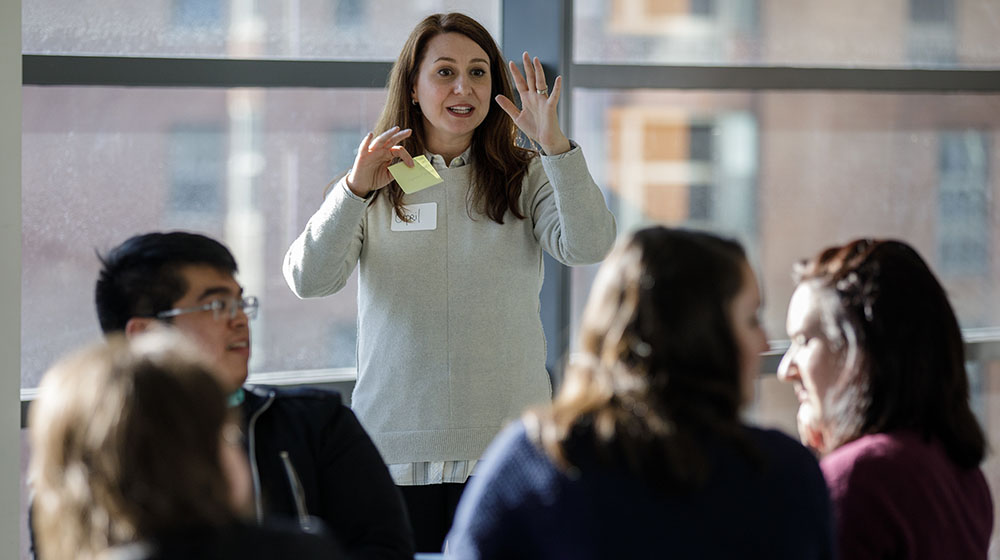 April Lane Schuster talking in a classroom